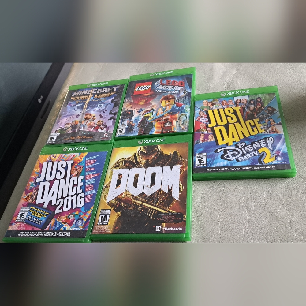 One Video Game Set with Green Cases
